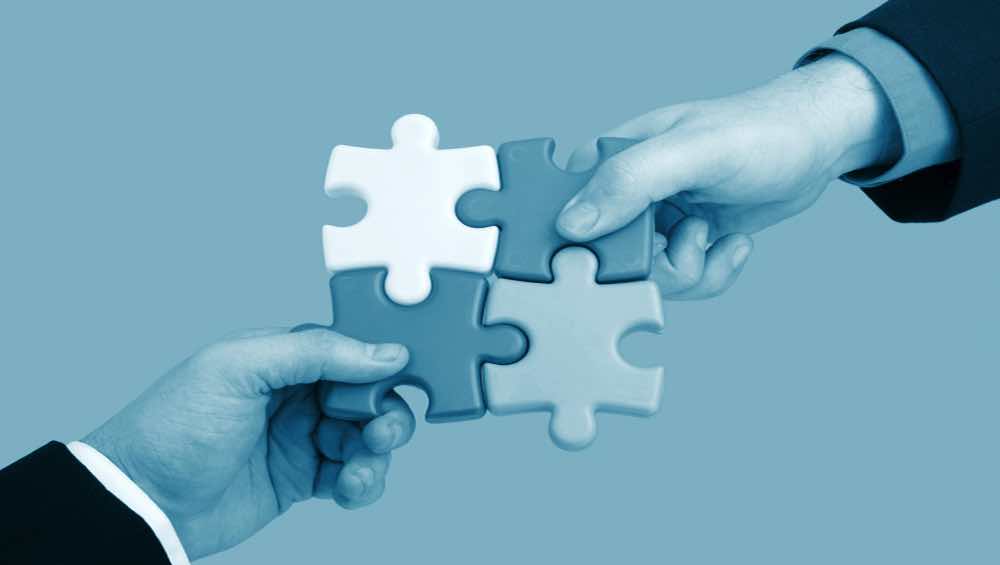Building business partnerhips partnering puzzle hands strategic alliances
