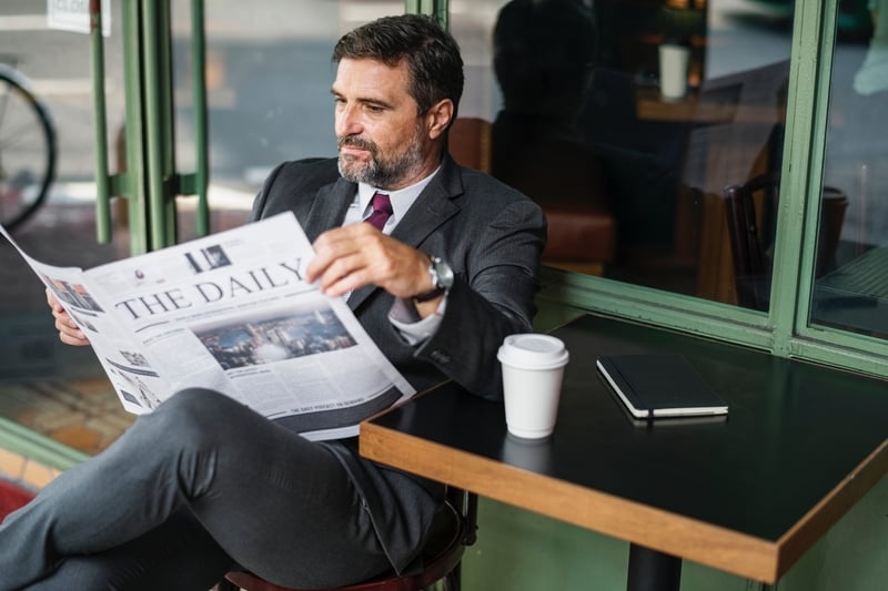 Businessman Morning Routine Reading Newspaper