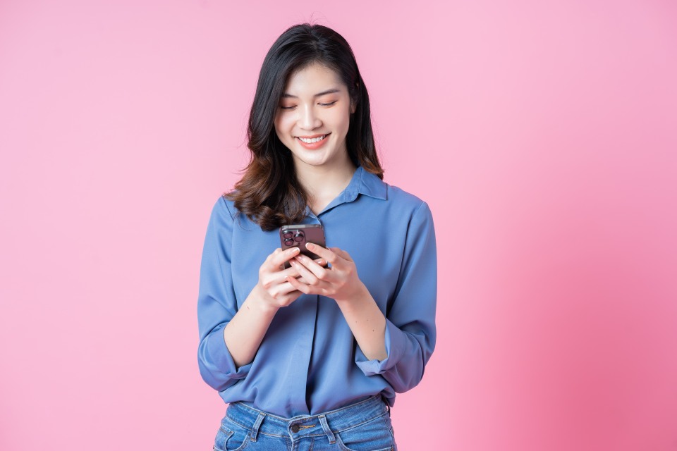 Female Woman Using Mobile Phone Smartphone Users Responsive