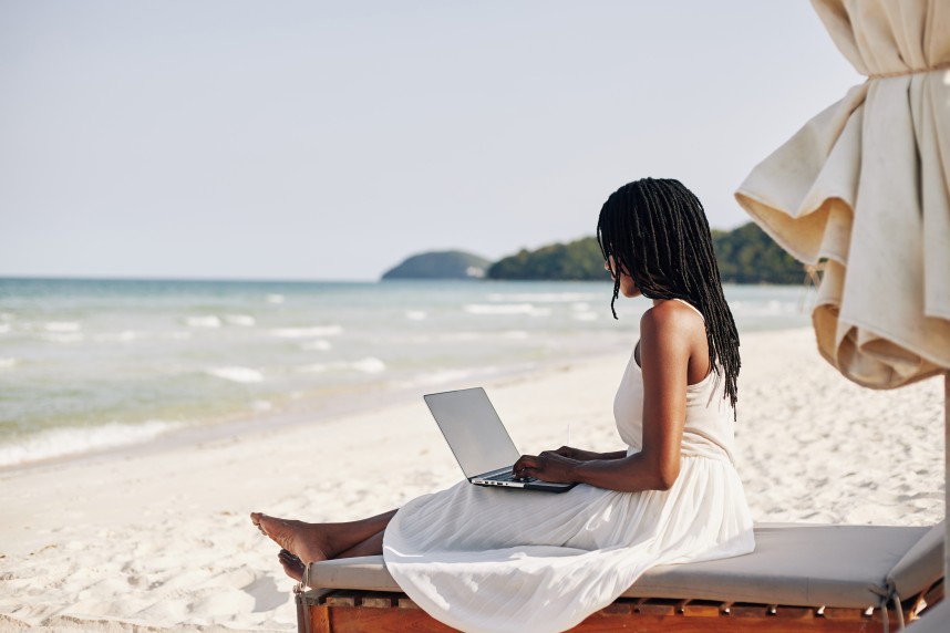 Work from Anywhere Woman Working Beach Laptop Digital Nomad