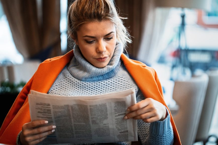 Woman Female Reading Newspaper News Adverts