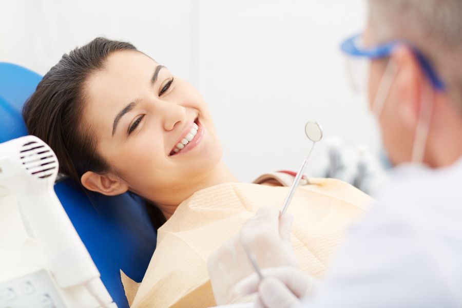 Young woman receiving dental check up