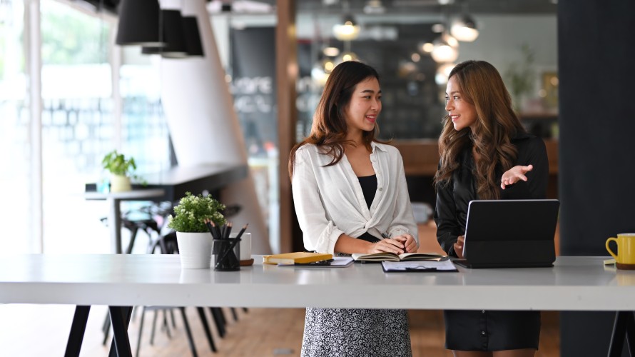 Businesswomen Cafe Tablet Set Up Google Analytics Configuration