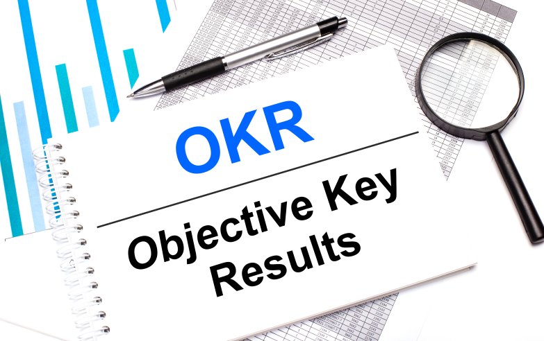 OKR Objective Key Results Table Pencil Graphs Notepad Metrics Glass Magnifyer