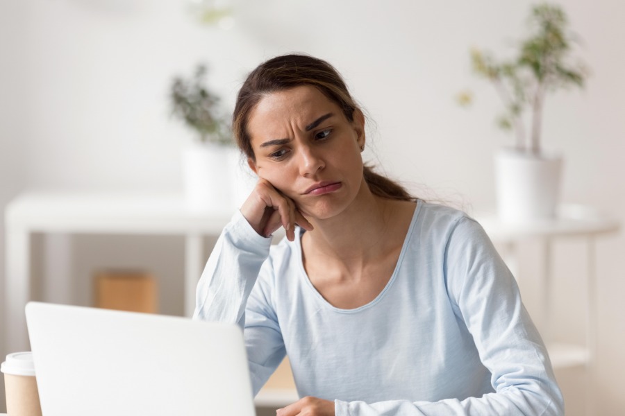 Woman Unhappy at Work Stressed Female Laptop Tech