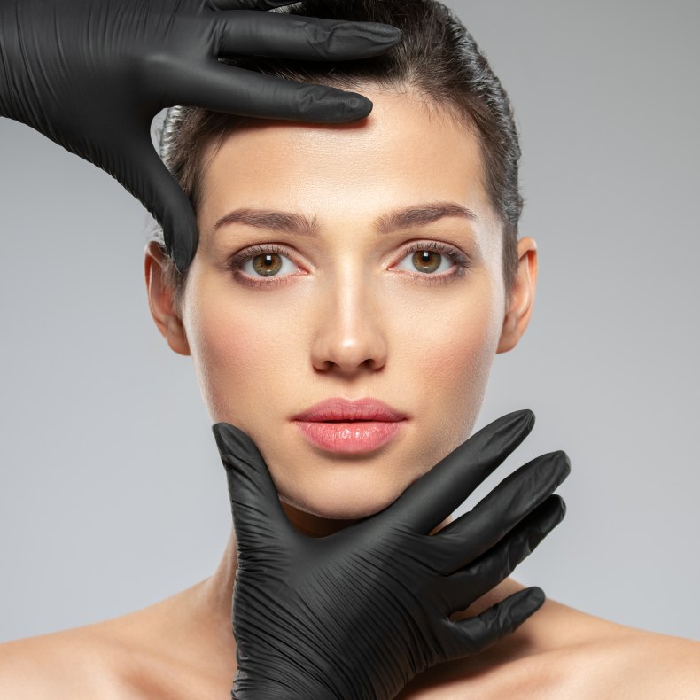 Doctor Checking Woman Female Face Skin Black Gloves Before Plastic Cosmetic Surgery