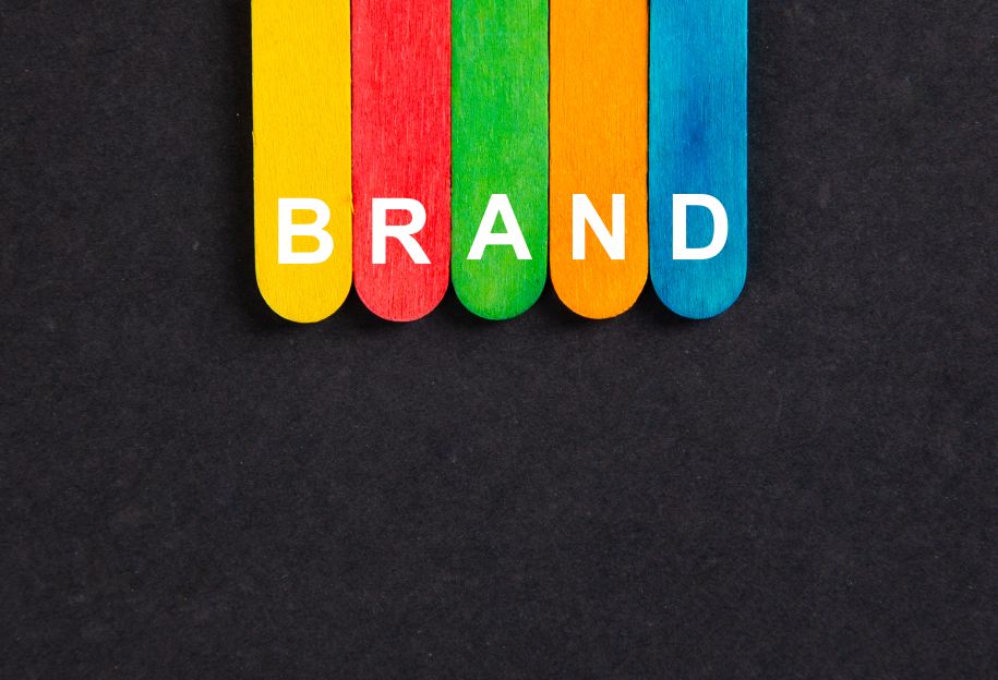 Brand text writing on colored sticks