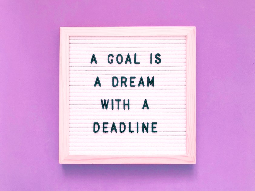 A Goal is A Dream with a Deadline Whiteboard Letters Purple Quote