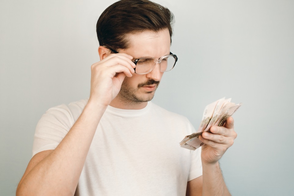 Man Male Glasses Looking Money Hands Low Budget Bills