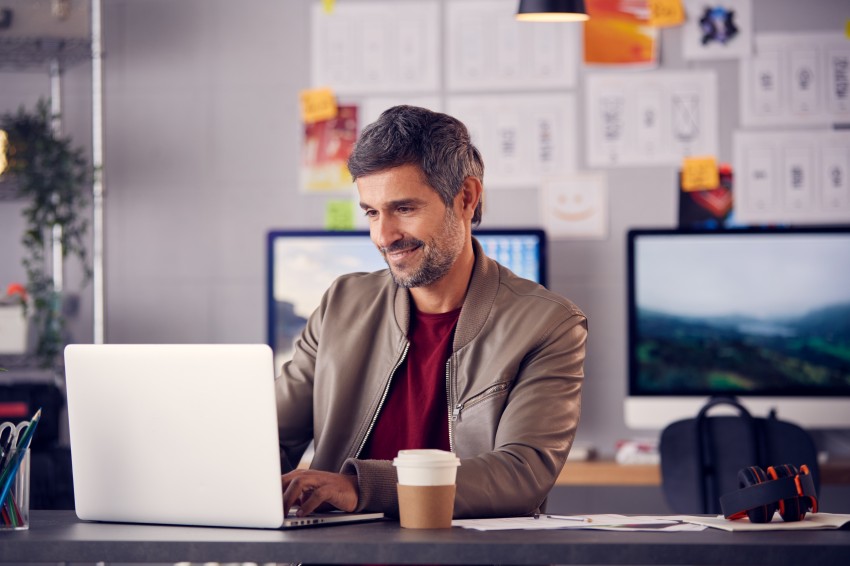 Mature Male Online Advertising Laptop Man Smiling Office Marketing