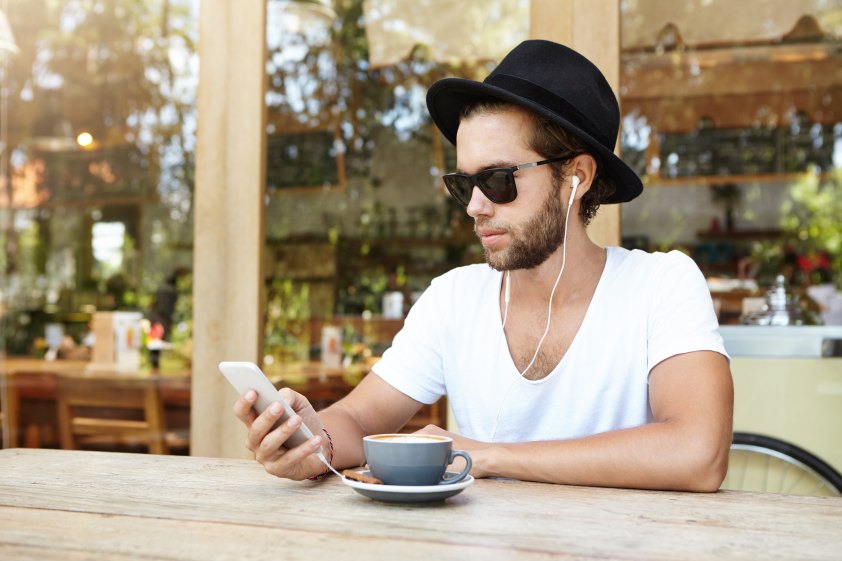 App User Man Male Hat Sunglasses Mobile Download Listen Music Earphones Coffee Shop