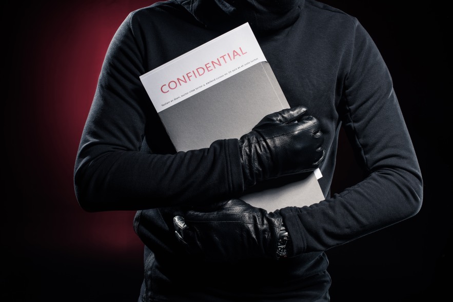 Confidentiality Risks Thief Stealing Confidential Documents Security Risk