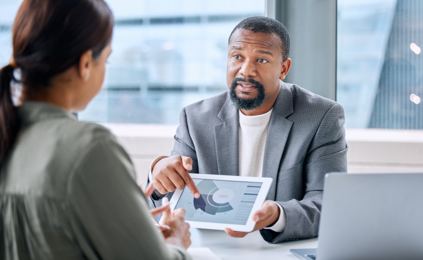 Male Consultant Conducting Market Research Showing Tablet Business Pain Points