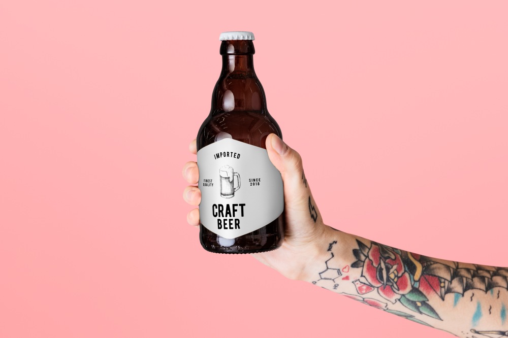 Craft Beer Bottle Label Packaging Brand Identity Logo Design Arm Tattoo Holding