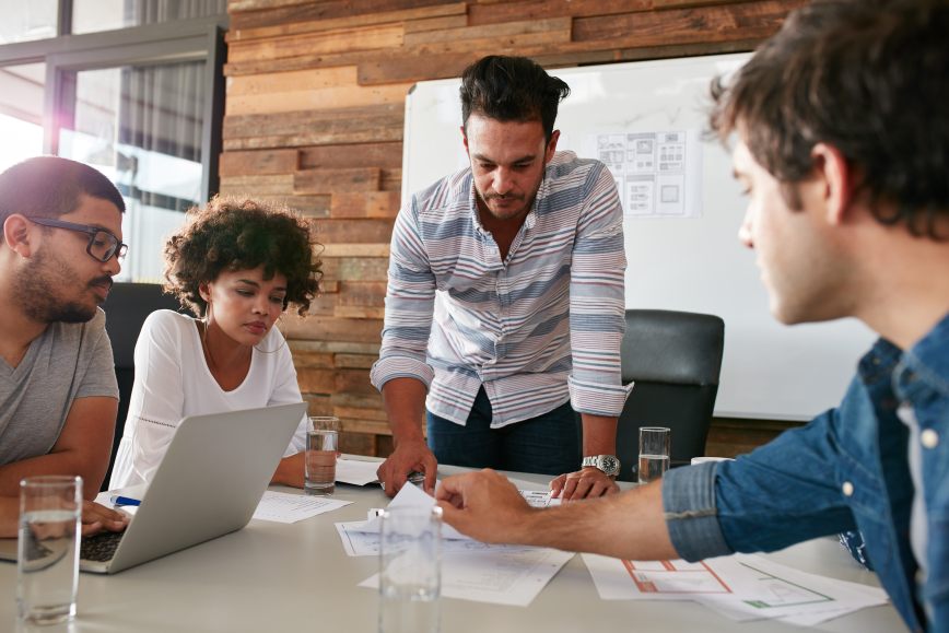 Marketing Team Discussing Market Plan Business Strategy Office Meeting