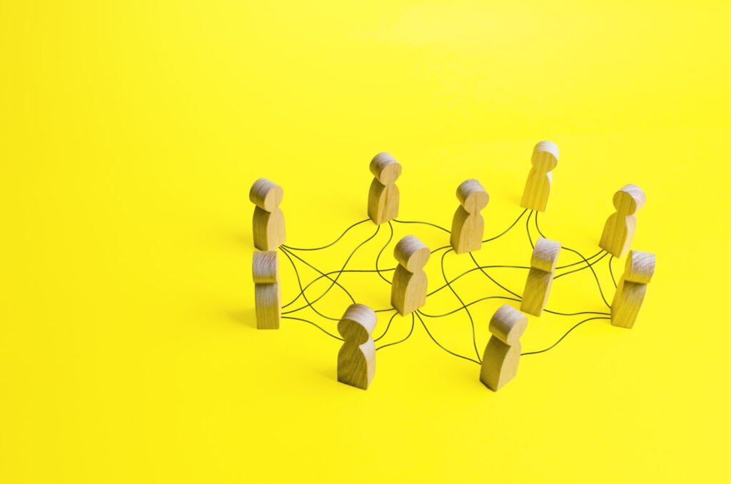 People connected by a network of lines. Relationship leadership concept