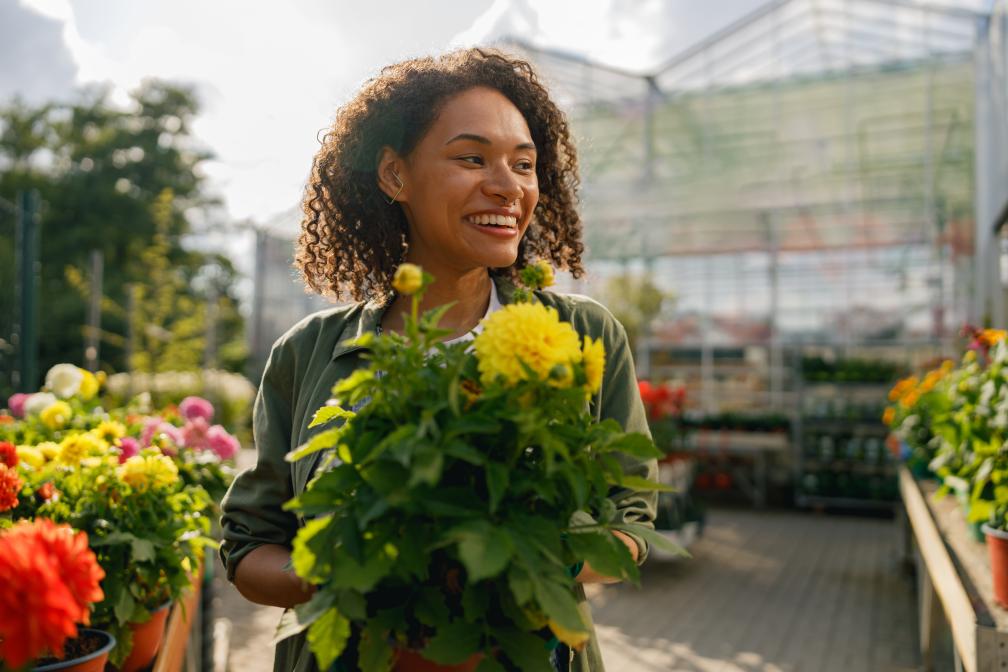 Gardener holding flower pot