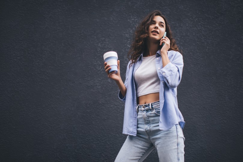 Millennial Woman Female Cellphone Modern Outfit Jeans