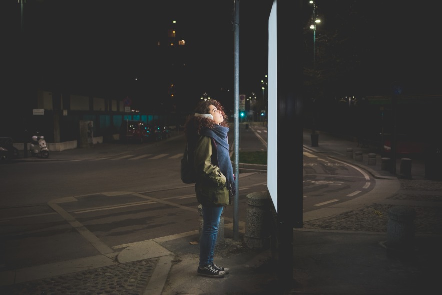 Woman Female Looking at Billboard Ad Outside Marketing City Life