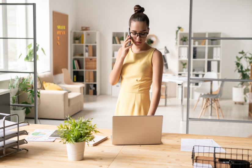 Woman Yellow Dress Office Laptop Solving Business Issues Phone