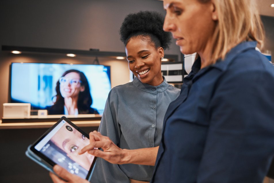 Two women looking at a tablet