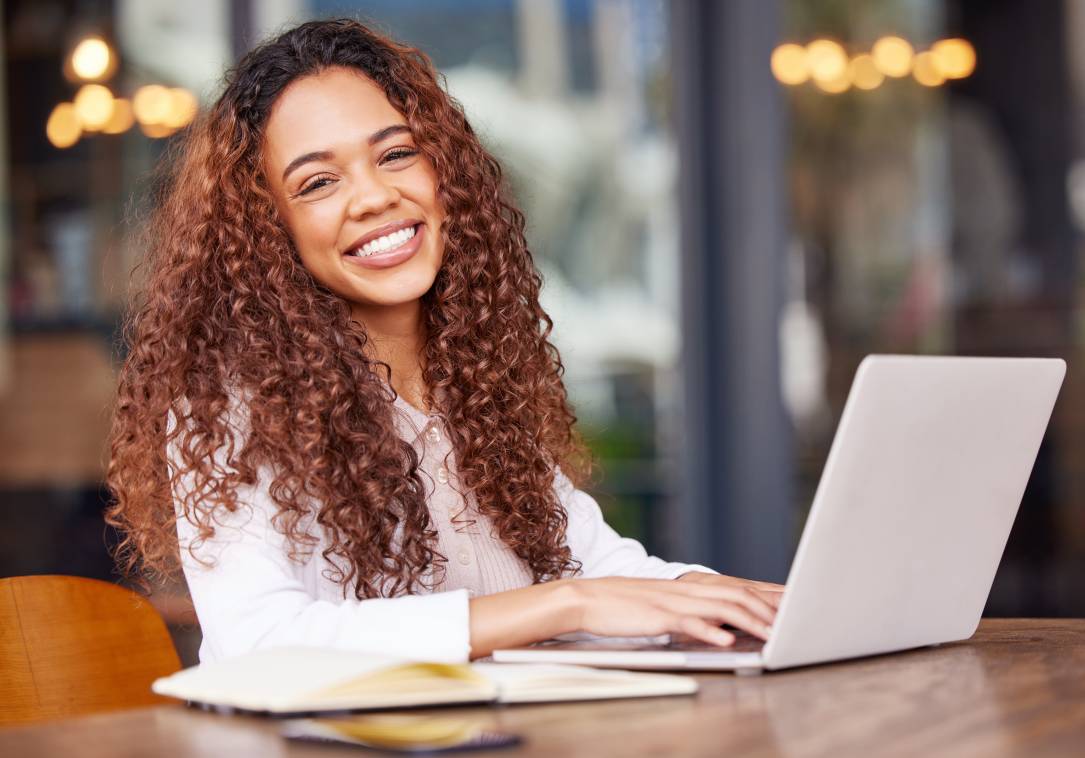 Shot of a young businesswoman using a laptop to craft an email for HARO response