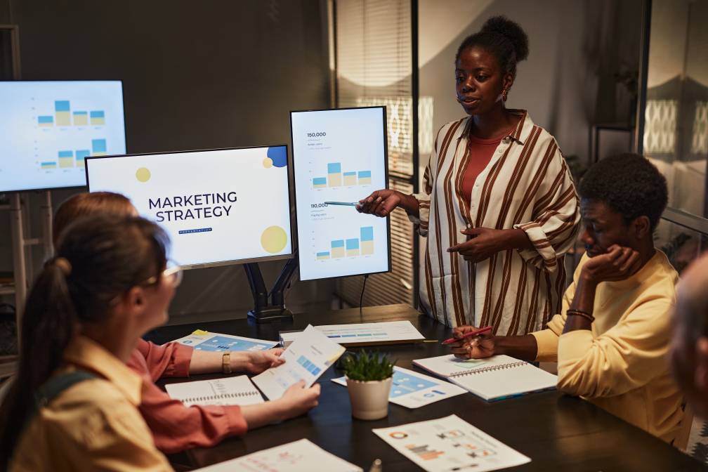 Woman presenting her marketing strategy to the team