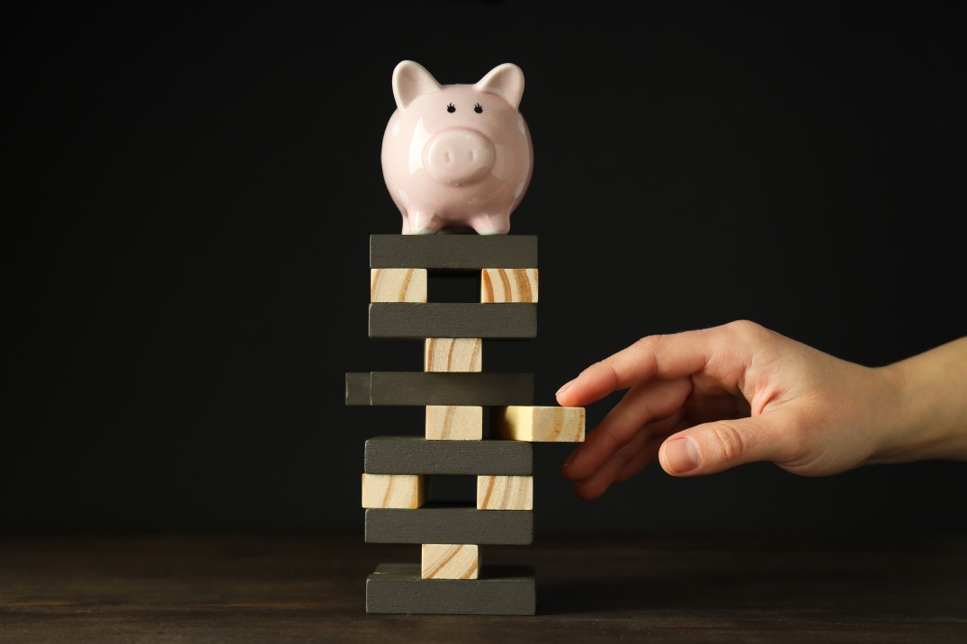 Financial Risk Concept Piggy Bank Jenga Finances Risks
