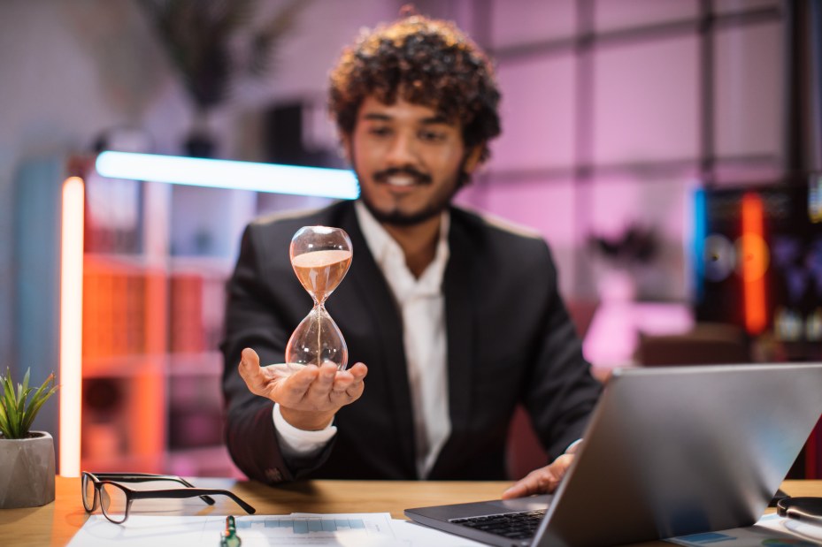 Prioritize Time Management Confident Businessman Hourglass