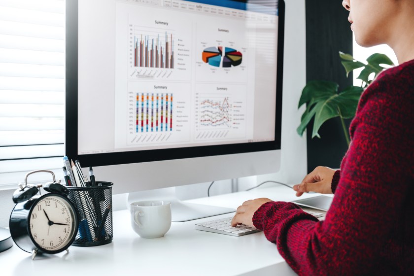 Woman Analyzing Website Analytics Big Data Computer Clock