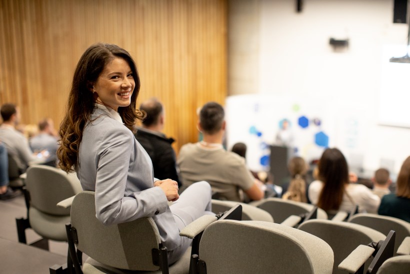 Young Professional Business Woman Event Show Smiling Happy