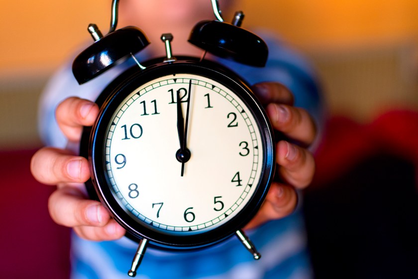 Man Holding Alarm Clock Timing Concept Business Time