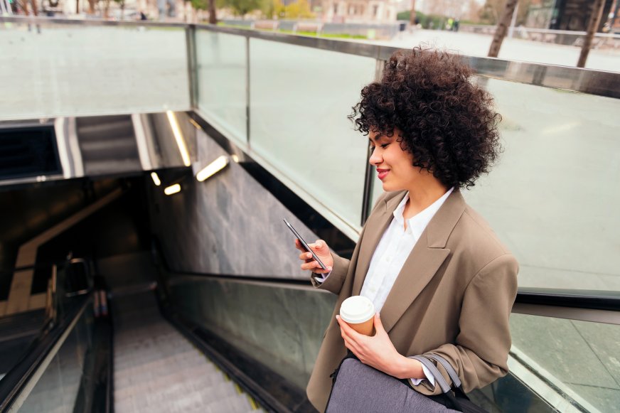 Woman Using Mobile Phone Smartphone Escalator