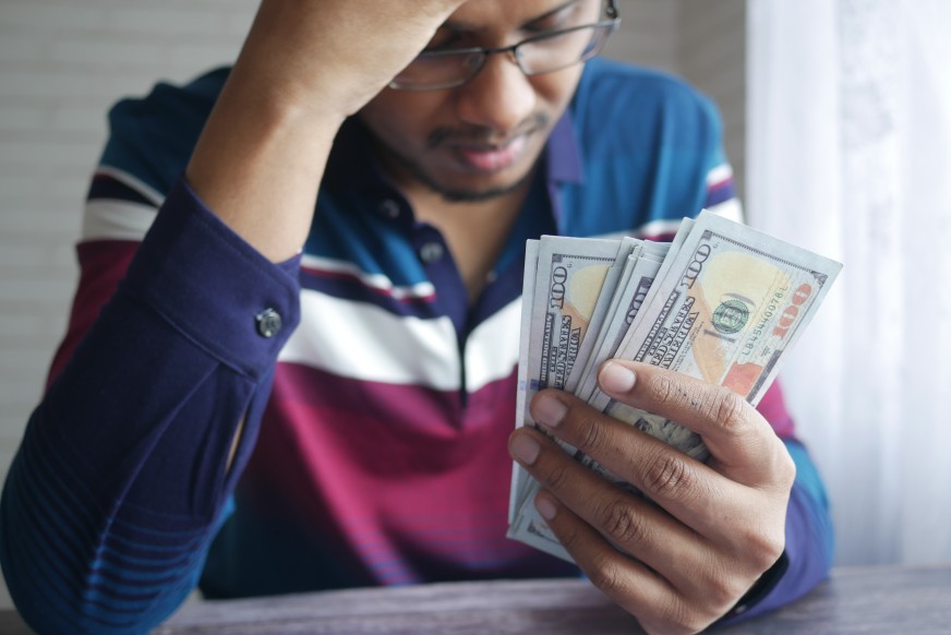 Upset Man Holding Money Dollar Bills Finance Budget Budgeting