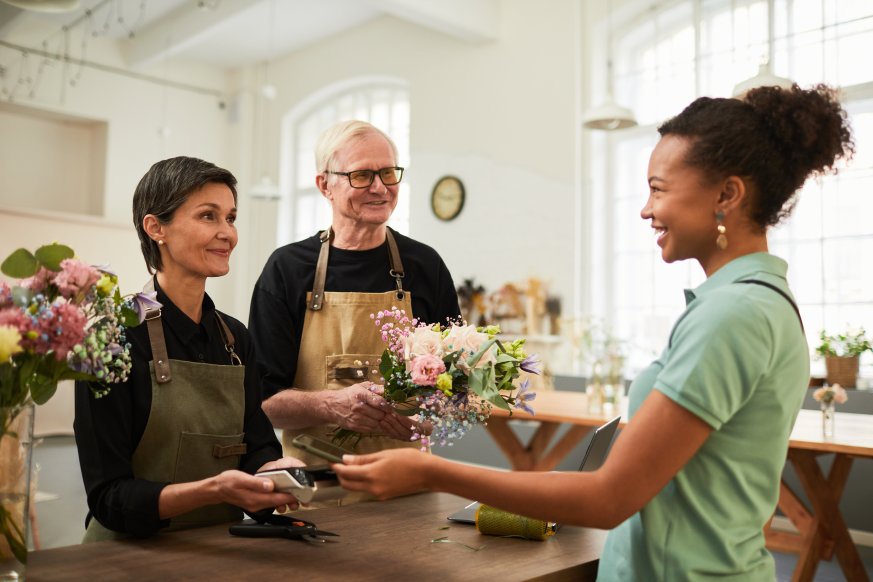 Woman Florist Giving Great Customer Service Success Satisfaction Customers