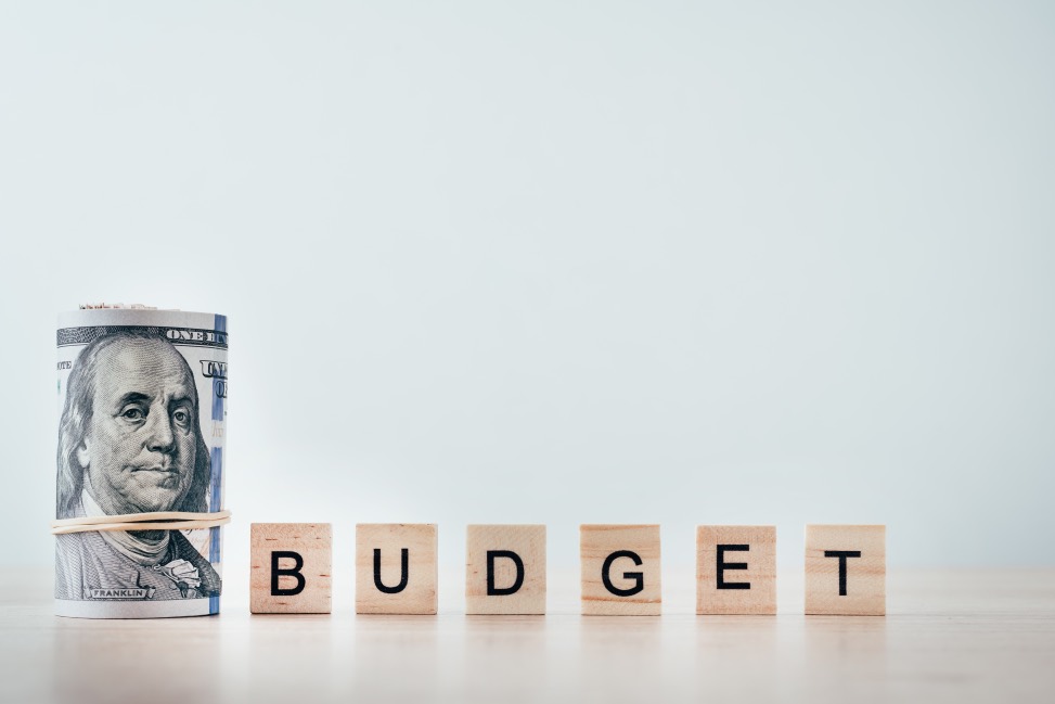 Define Budget Concept Influencer Social Media Marketing Campaign Dollar Bills Roll Scrabble Letters