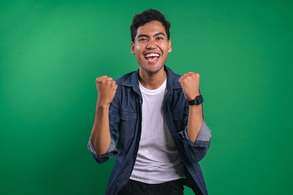 Man Celebrate Success after getting inspiration from an aha moment example