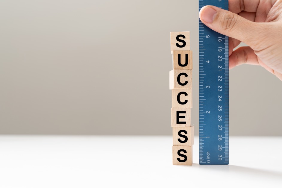 Measure Success Concept Ruller Hand
