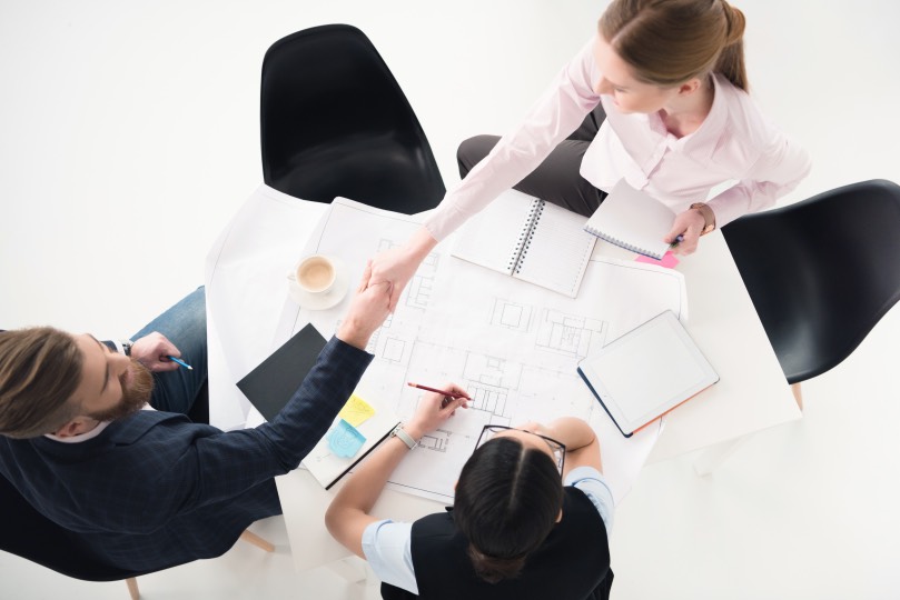Negotiating Terms Agreement Business Shaking Hands