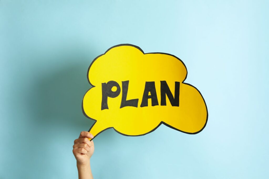 Female hand hold cloud with text Plan on blue background