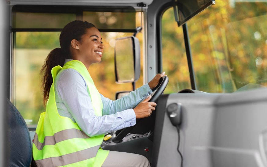 Improve Driver Safety Woman Smiling Driving Truck