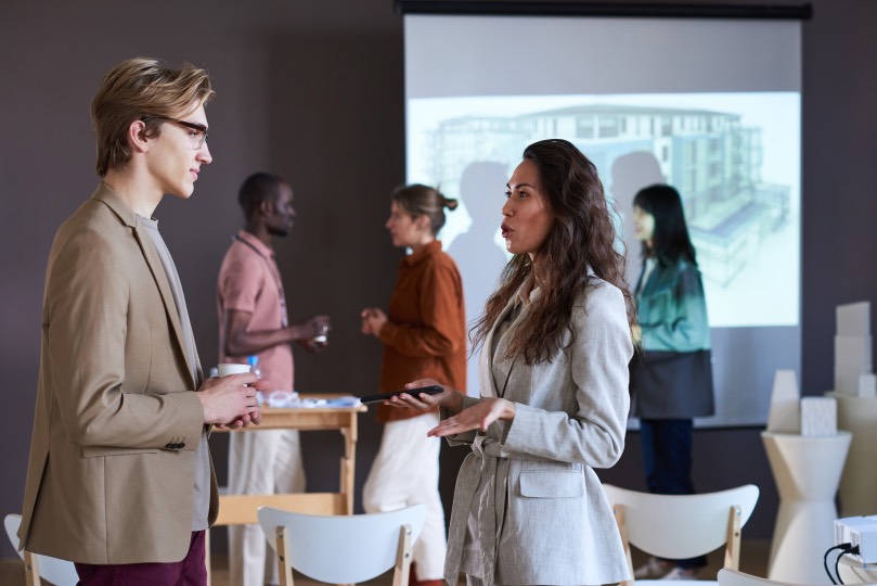 Business People Networking Talking at Trade Show