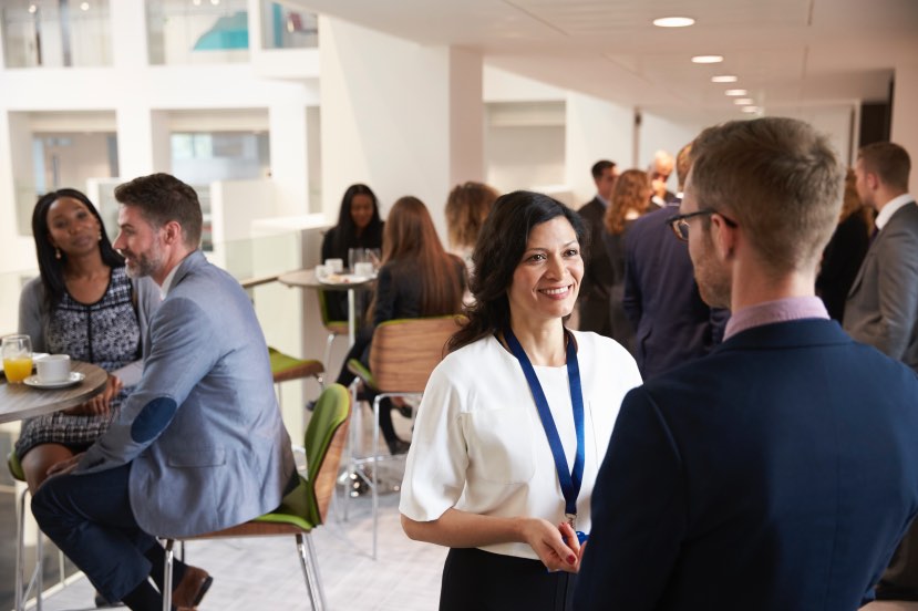 People Networking During a Break at Trade Shows, Seminars and Conferences