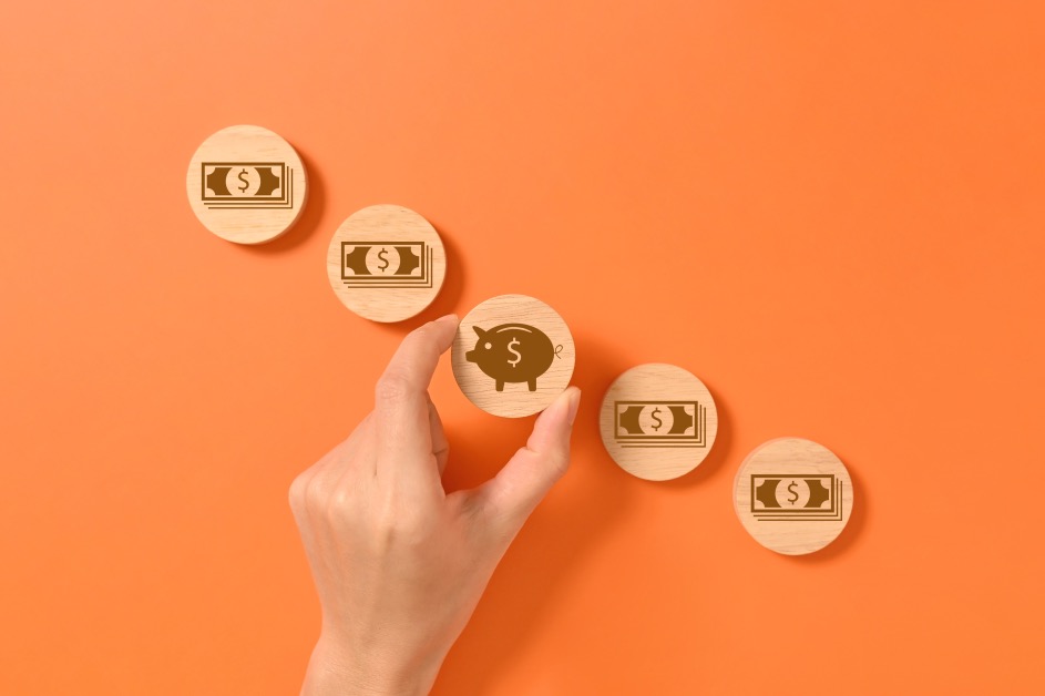 Cut Costs Reduce Cost Wooden Blocks Dollar Piggy Bank Hand