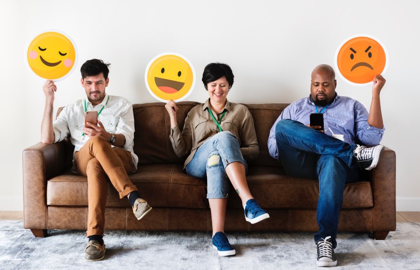 Sentiment Analysis Concept Diverse People Sofa Emotions Holding Emojis