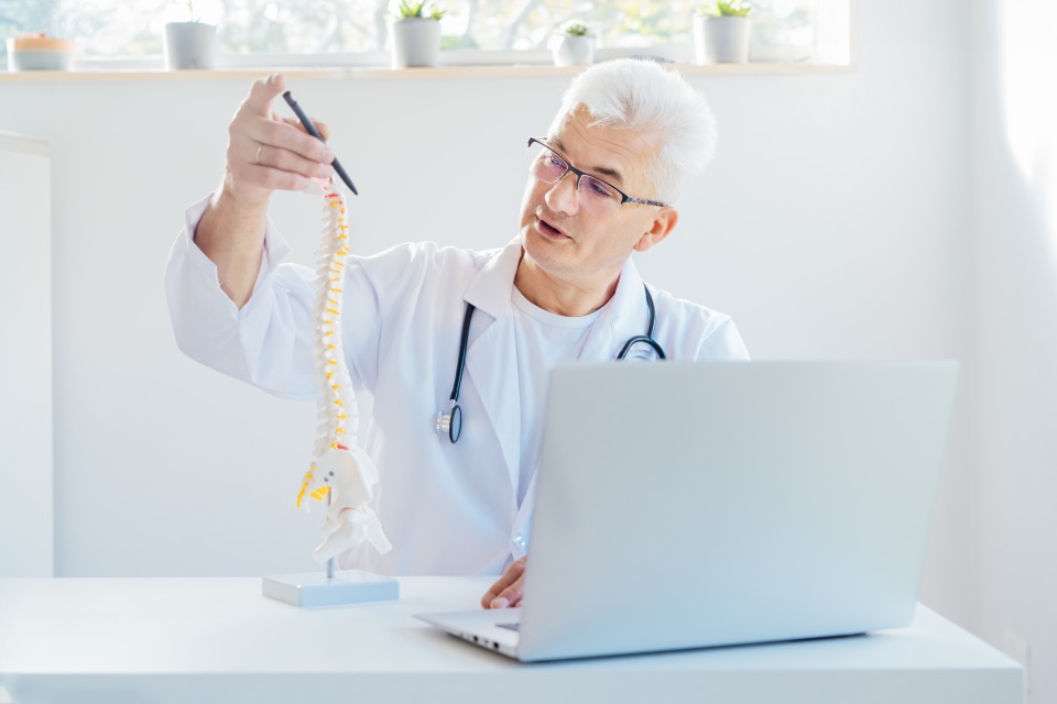 Mature Chiropractor Man Male Doctor Content Video Laptop