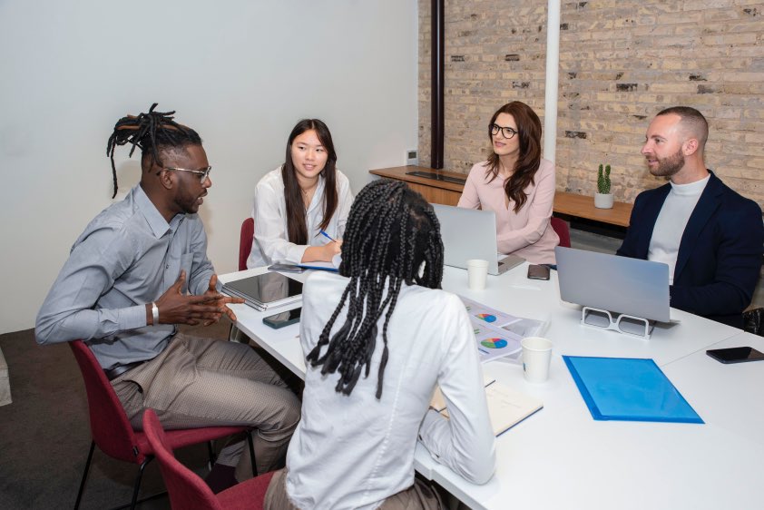 Team Meeting Business Professionals Table Desk Office Men and Women