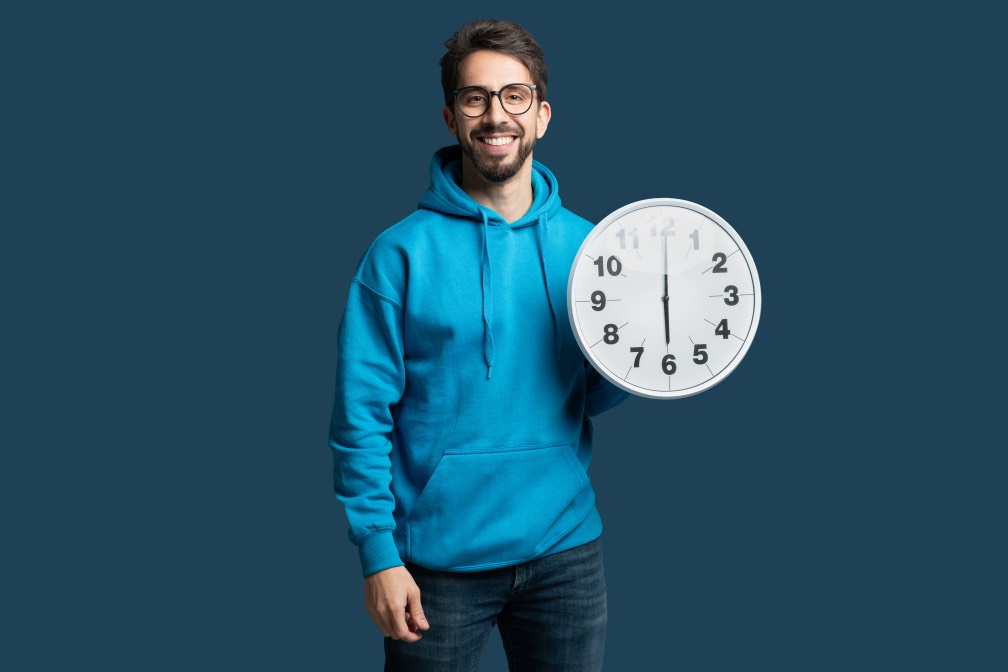 Young Man Holding Clock Blue SEO Time Timing Concept